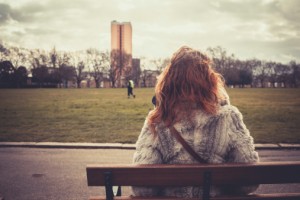 woman alone on bench