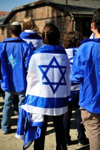 Student wearing an Israeli flag at the Auschwitz concentration camp