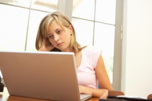 teen girl on computer