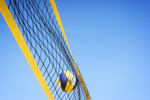 40818734 - beach volleyball caught in the net.