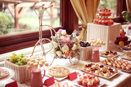 43272257 - table setting with flowers and sweets