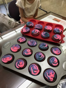 Cupcakes decorated in Young Women of Grace colors of pink and purple. 