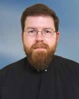 Father Joshua D. Genig